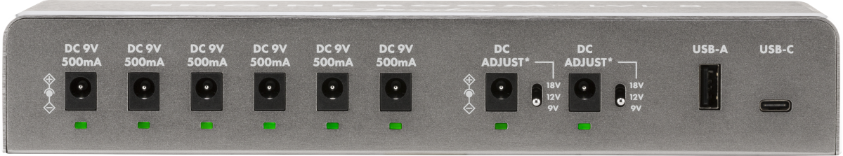 The image shows a power supply unit for guitar effects pedals and pedalboards, featuring six 9V DC outputs (500mA each), two adjustable voltage outputs (9V, 12V, 18V), and USB-A and USB-C ports. It includes LED indicators for power status. This device centralizes power for multiple pedals, reduces cable clutter, ensures clean, isolated power, and supports both vintage and modern digital pedals, making it essential for musicians.