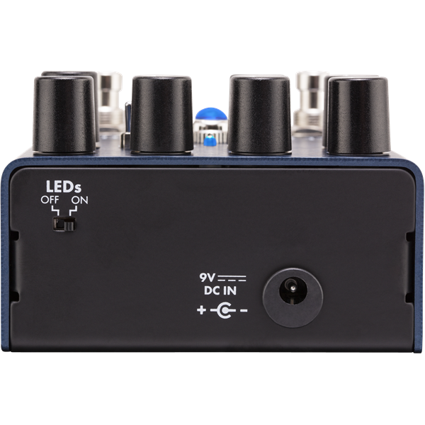 The image shows a compact black guitar effects pedal with four control knobs, input/output jacks, a 9V DC power input, and an LED indicator for on/off status. Designed to modify electric guitar sounds, it allows musicians to create effects like distortion, delay, or chorus by stepping on the pedal to engage or bypass the effect. Its durable build suits both live and studio use.