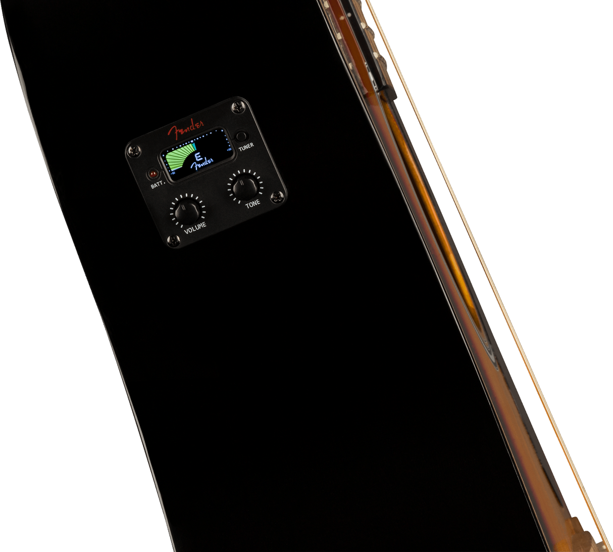 The image shows a close-up of a Fender acoustic guitar preamp/EQ system installed in a black guitar body. It features a digital tuner displaying the note "C" with Fender branding, two control knobs labeled "VOLUME" and "TONE," and a battery indicator light. Part of the guitar’s wooden edge is visible. This built-in system allows for amplification and convenient tuning during live or recording sessions.