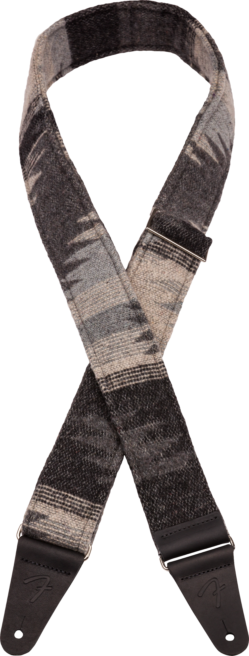 The image shows a guitar strap with a grayscale woven pattern in shades of gray and black. It has dark leather or synthetic leather end tabs with adjustment holes for attaching to a guitar. This strap combines functionality and style, allowing musicians to play standing while supporting the instrument’s weight. Its modern design and adjustable length offer comfort and a sophisticated look that suits various guitars and playing styles.