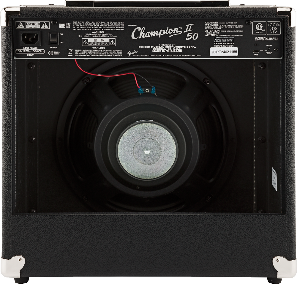 The image shows the back panel of a Fender Champion II 50 guitar amplifier with a black tolex finish and metal corner protectors. It features an open-back 12-inch speaker cabinet, power rating of 100-120V, 50/60Hz, 110W, and various safety labels. Red and blue speaker wiring is visible. Made in Thailand, this 50-watt amp offers mid-level volume and projection with a spacious, ambient sound ideal for practice and small performances.