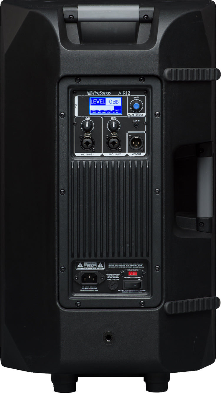 The image shows the back panel of a PreSonus AIR12 powered PA speaker featuring a digital display with level and waveform meters, input controls with dual MIC/LINE level knobs, master volume, XLR/TRS combo inputs, XLR mix output, aux input, power connection with on/off switch, built-in amplifier, carrying handle, and corner guards. This 12-inch active speaker is suited for live sound, DJing, and presentations.