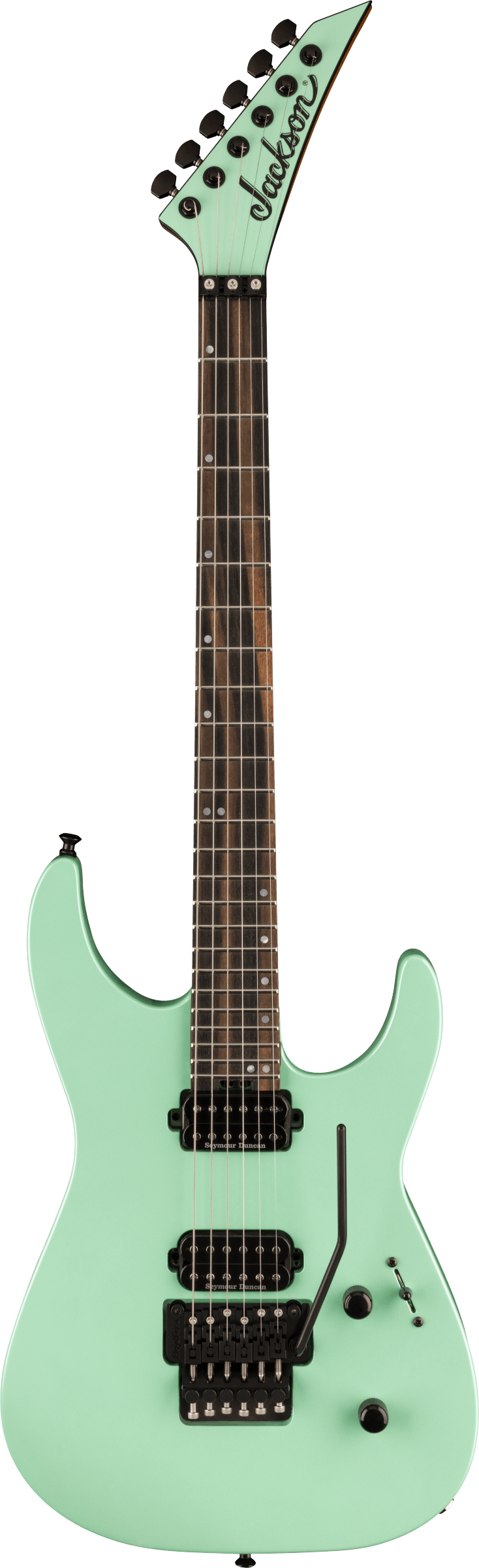 The image shows a seafoam green Jackson electric guitar with a pointed headstock and six tuning pegs. It has a dark wood fretboard with dot inlays, two black humbucker pickups, a Floyd Rose tremolo bridge, and volume and tone knobs. Featuring a superstrat body shape with cutaways, this guitar is designed for rock and metal styles, blending vintage color with aggressive modern design.