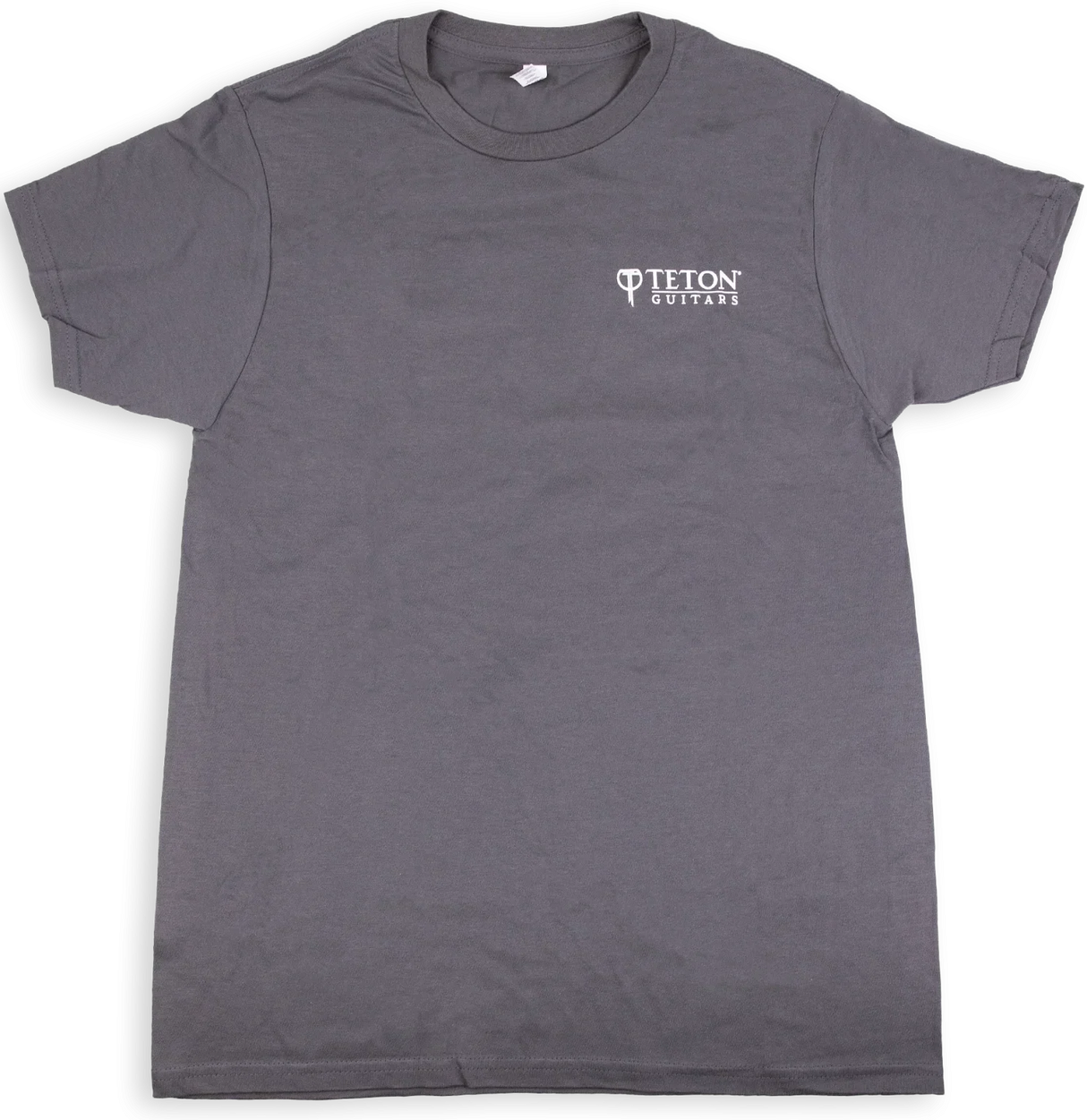 The image shows a gray t-shirt with the "Teton Guitars" logo printed in white on the chest. This branded apparel is merchandise from Teton Guitars, a company known for producing acoustic guitars. The shirt likely serves as promotional or fan gear, representing the type of merchandise musical instrument manufacturers create to promote their brand and generate additional revenue.