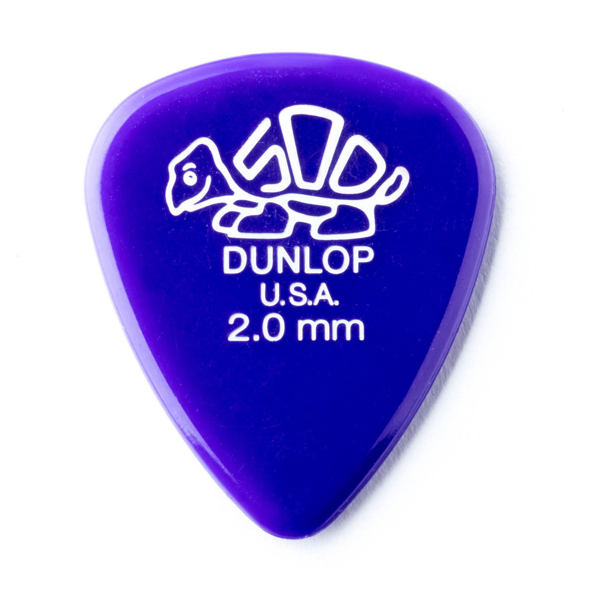 A 'Dunlop' branded purple guitar pick with a turtle design on a white background