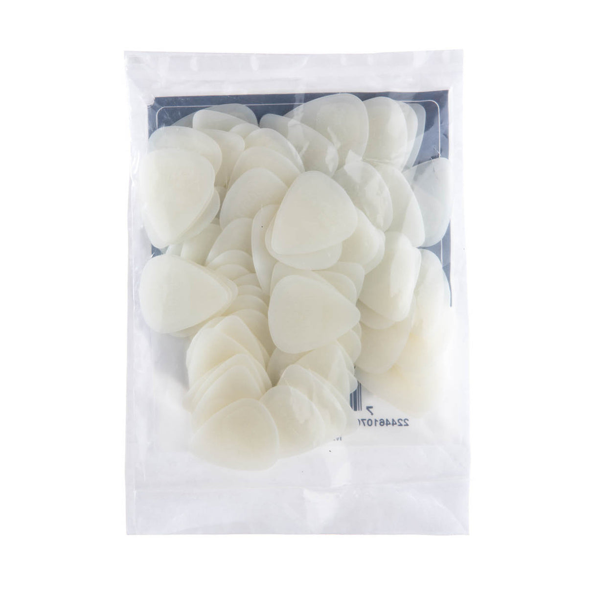 A plastic bag filled with glow in the dark guitar picks on a white background