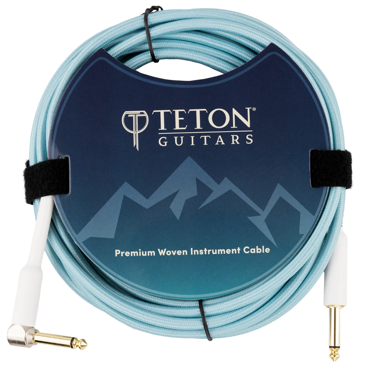 The image shows a Teton Guitars Premium Woven Instrument Cable with a light blue/turquoise woven jacket for durability and style. It has one straight and one right-angle 1/4" (6.35mm) gold-plated plug. The cable is coiled and secured with velcro, displayed in branded packaging featuring a mountain-themed design. This cable is ideal for connecting guitars, basses, and other instruments to audio gear, offering enhanced protection and signal quality.
