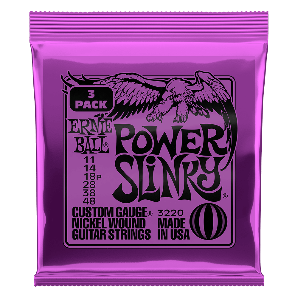 Purple packaging of Ernie Ball Power Slinky guitar strings on a black background