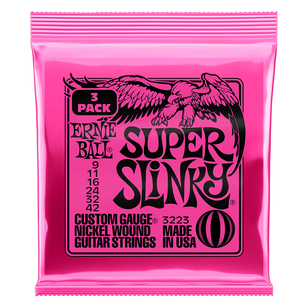 Pink packaging of Ernie Ball Super Slinky guitar strings on a black background