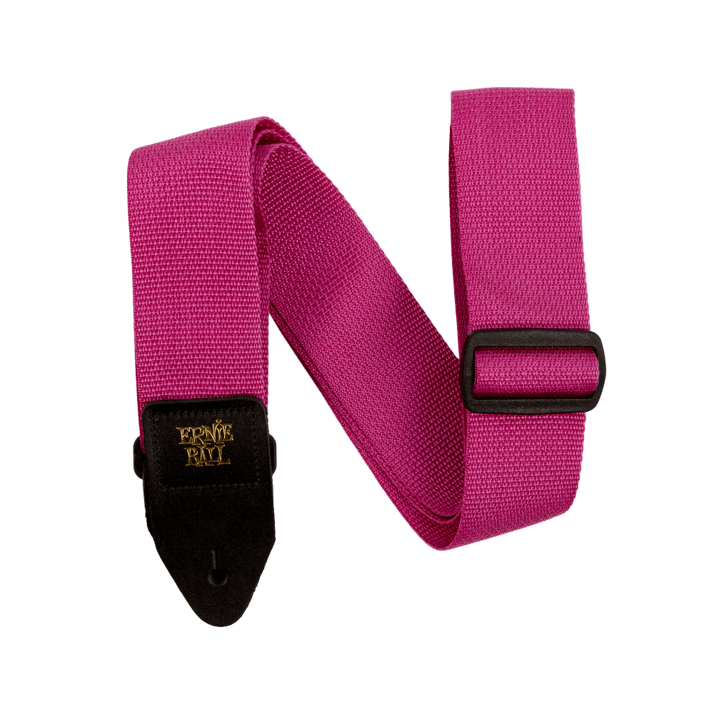 Pink guitar strap with a black buckle and gold Ernie Ball logo on a white background