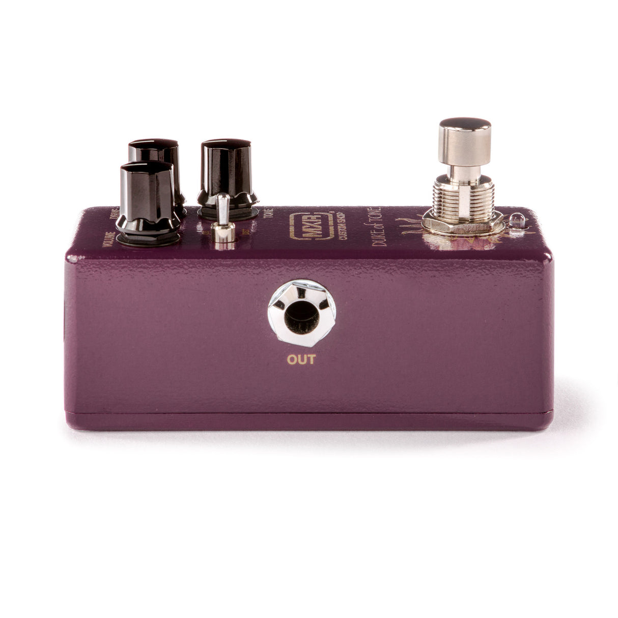 The image shows a compact, purple/burgundy guitar effects stompbox pedal with two dark control knobs on the left, one silver knob on the right, a 1/4" output jack labeled "OUT," a silver footswitch, and branding on top. This pedal is used by guitarists to modify their sound, connecting between guitar and amp to create effects like distortion, delay, or reverb. It’s designed for live and studio use, powered by a 9V battery or adapter.
