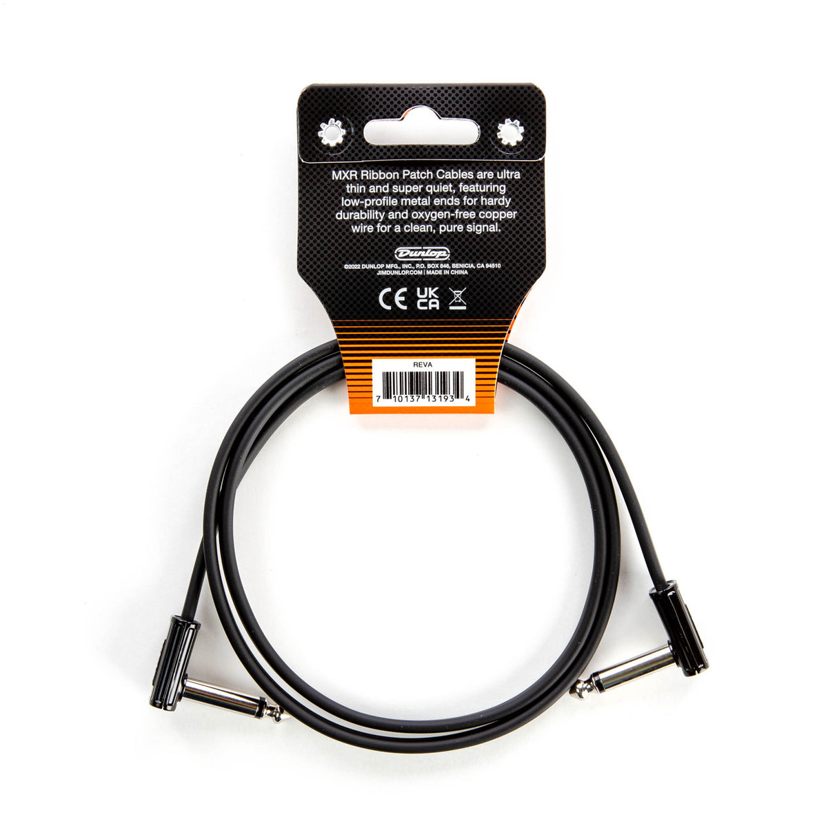 The image shows an MXR Ribbon Patch Cable by Dunlop, a black, flat, ultra-thin cable with two right-angled metal jack plugs. Packaged with a black and orange header card, it’s a short cable designed for connecting guitar effects pedals. The packaging highlights its ultra-thin, quiet design, low-profile metal ends, and oxygen-free copper wire for durability and clean signal transmission.