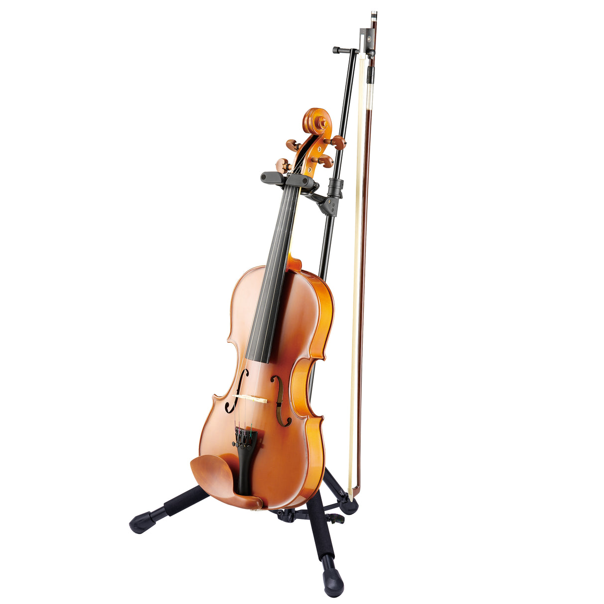 A violin resting on a black stand on a white background