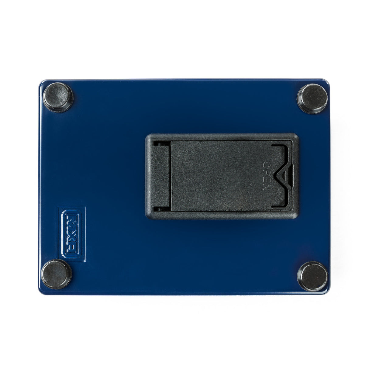 The image shows a blue guitar effects pedal with a metal casing and four rubber feet. It features a central black battery compartment likely for a 9V battery, marked with a battery symbol. A brand logo is visible on the lower left. This pedal is used by musicians to alter instrument sounds with effects like distortion or delay. Its sturdy build and rubber feet help protect surfaces and withstand pressure during use.