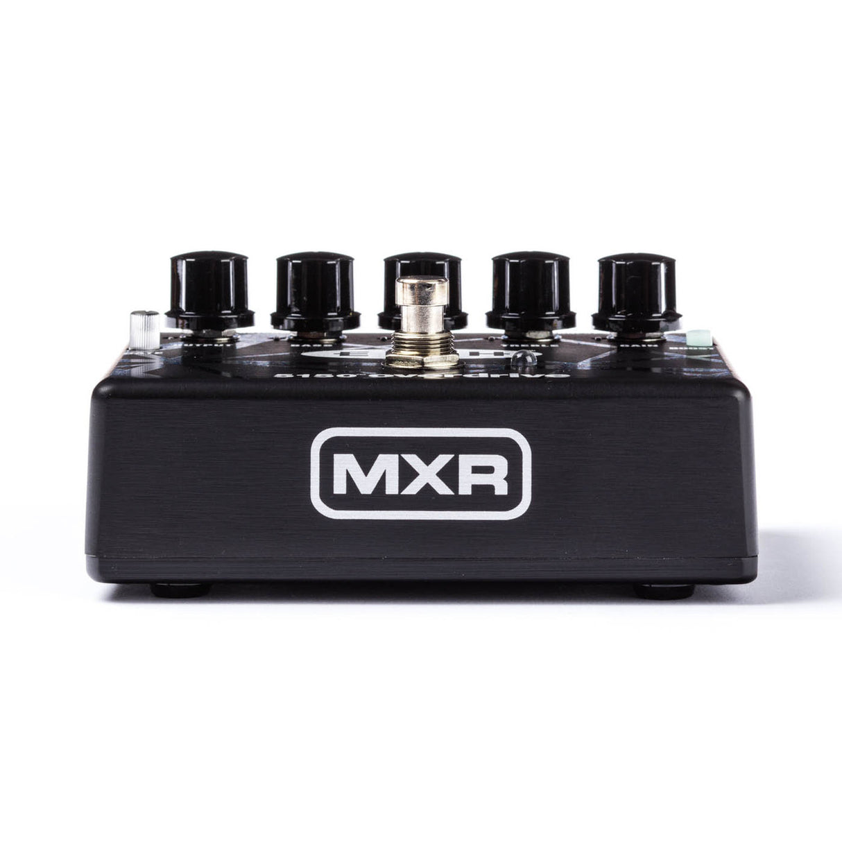 The image shows an MXR guitar effects pedal with a black metal housing and white MXR logo. It features five black control knobs, a gold-colored footswitch in the center, and a small toggle switch on the left. MXR pedals are popular stompboxes used by guitarists to modify electric guitar sounds, though the exact effect of this model is unclear from the image.