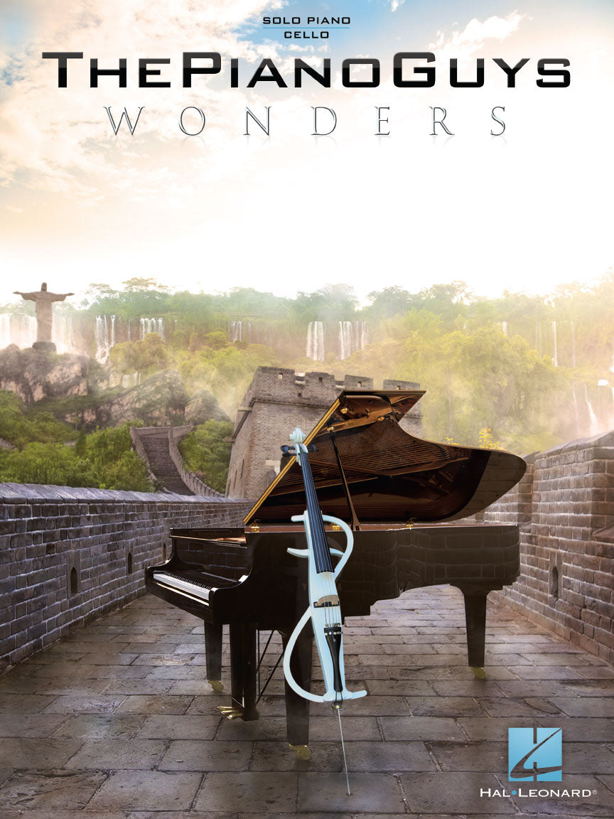 The image shows the cover of "The Piano Guys - Wonders" songbook published by Hal Leonard. It features a black grand piano with its lid open and a white electric cello, both set on the Great Wall of China with waterfalls in the background. The top indicates arrangements for solo piano and cello, reflecting The Piano Guys’ blend of classical and contemporary music. The Hal Leonard logo appears at the bottom right.