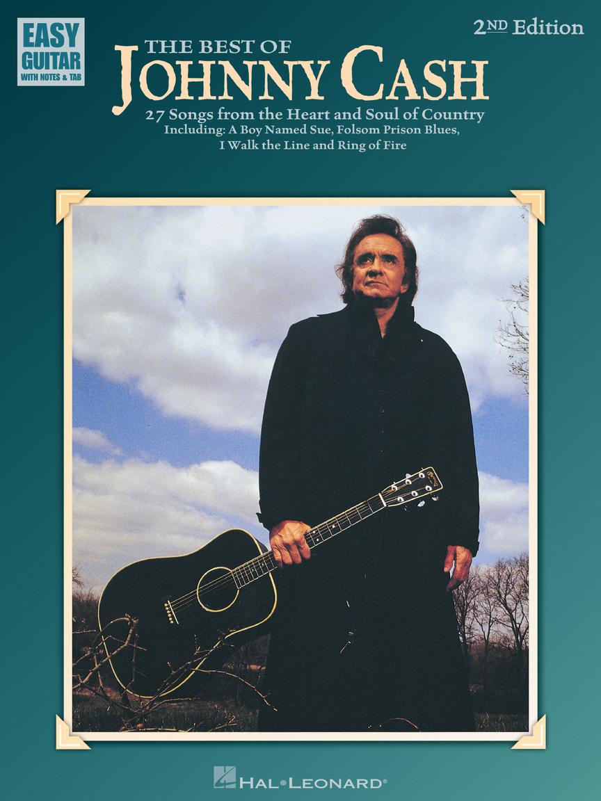 The image shows the cover of "The Best of Johnny Cash" (2nd Edition) guitar songbook published by Hal Leonard. Part of the "Easy Guitar with Notes & Tab" series, it features 27 beginner to intermediate songs, including hits like "A Boy Named Sue," "Folsom Prison Blues," and "Ring of Fire." The cover depicts Johnny Cash in his signature black outfit holding a black acoustic guitar against a moody sky with bare trees.