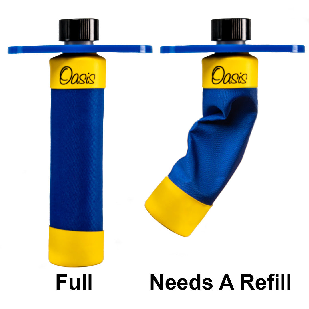 The image shows two Oasis musical instrument humidifier water bottles. The left bottle is full, while the right one is deflated, indicating it needs a refill. Both bottles feature blue and yellow branding with black caps. These humidifiers help maintain proper humidity in wooden instruments like guitars and violins, preventing damage from dry conditions by being placed inside cases or sound holes.