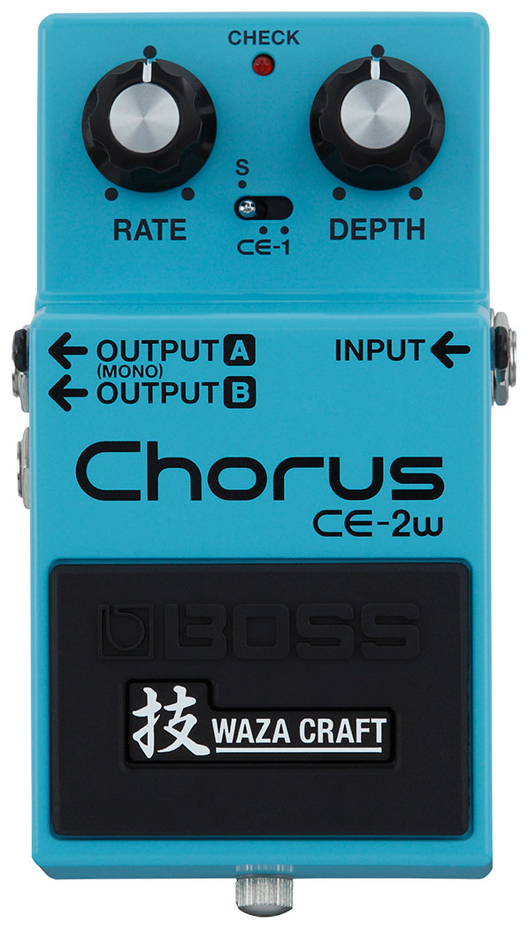 The image shows a Boss CE-2W Waza Craft Chorus guitar pedal, a modern reissue of the classic CE-2. It features two black knobs labeled RATE and DEPTH, a central toggle switch marked "S," a red CHECK LED, an input on the right, and two outputs for mono and stereo. The pedal has a turquoise body, Boss branding, and a Waza Craft logo with Japanese characters, offering vintage and modern chorus tones.