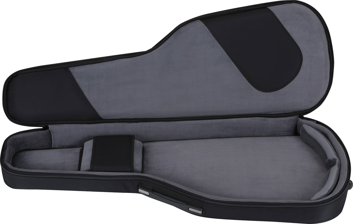 The image shows an open hard or semi-hard guitar case with a black exterior and gray padded interior. It has a guitar-shaped form with protective cushioning, a small accessory compartment, and a zippered closure. The empty case displays a molded interior designed to securely hold and protect a guitar during transport or storage.