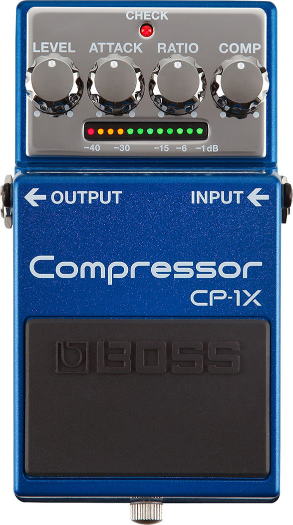 The image shows a BOSS CP-1X Compressor guitar pedal with a blue metal chassis and black footswitch. It features four control knobs (LEVEL, ATTACK, RATIO, COMP), a red LED "CHECK" button, and a multicolored LED compression meter (-40dB to -1dB). Input and output jacks with arrows are visible. Known for multiband compression, it offers transparent sound and dynamic control for electric and acoustic guitars.