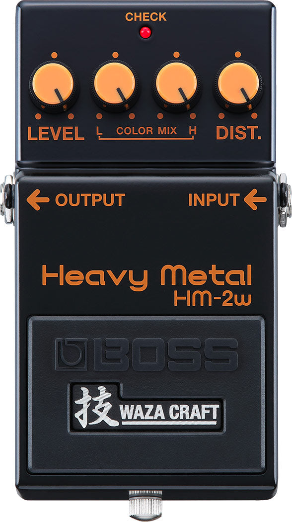 The image shows a Boss Heavy Metal HM-2W guitar effects pedal from the Waza Craft series. It features four knobs (Level, Color Mix Low/High, Distortion), a red LED indicator, 1/4" input/output jacks, and a black/orange design. This modern reissue of the classic 1980s HM-2 delivers heavy distortion favored in extreme metal, offering vintage and modern voicing modes for versatile heavy tones.
