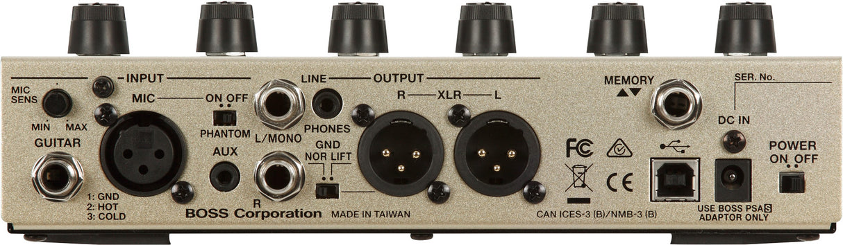 The image shows the back panel of a BOSS Corporation multi-channel audio interface or preamp. It features XLR mic input, 1/4" guitar input, mic sensitivity control, phantom power switch, and AUX input. Outputs include XLR and 1/4" line outs, headphone jack, ground lift, and phase switches. Additional controls include six knobs, memory buttons, USB port, DC power input, on/off switch, serial number, and FCC/CE marks.