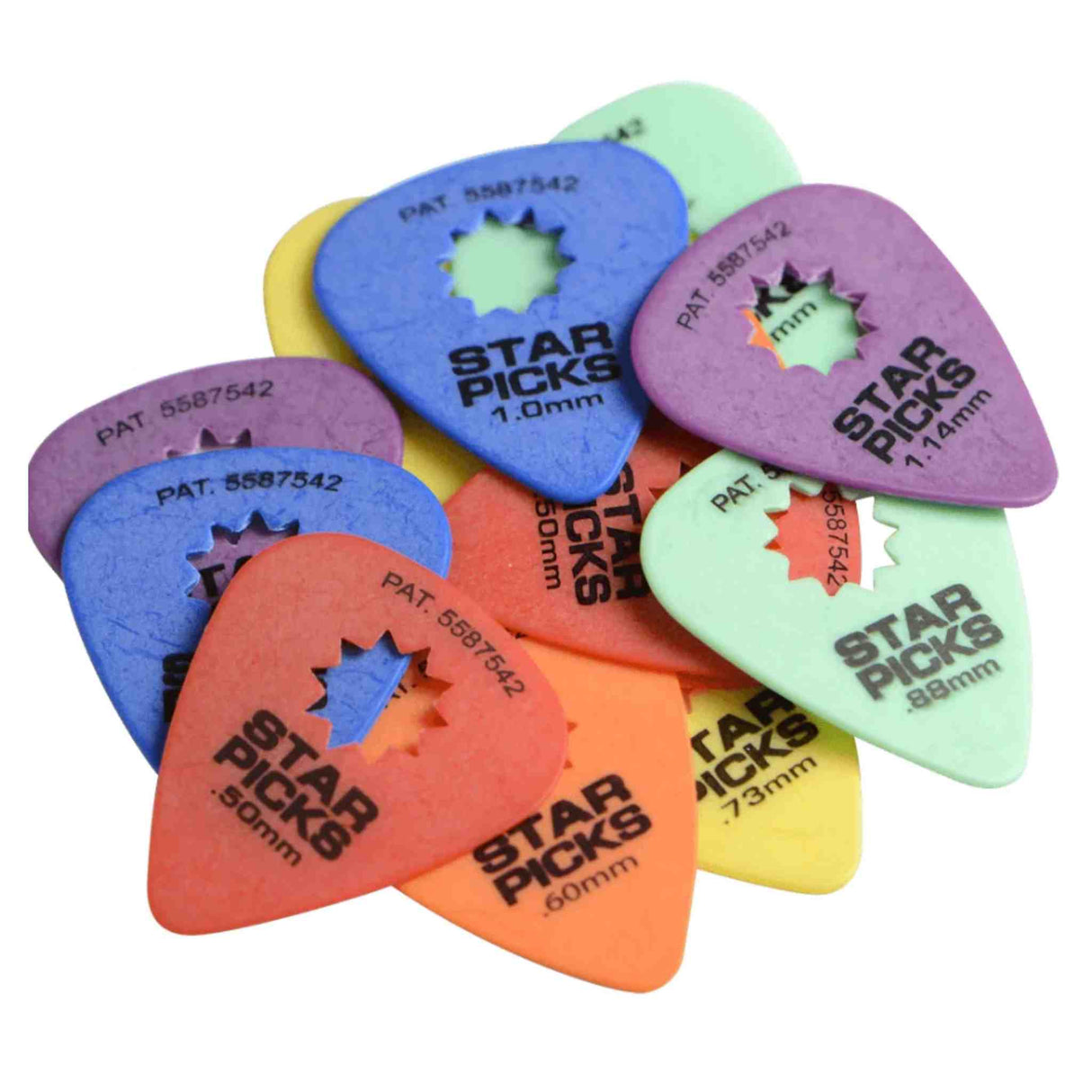 The image shows a collection of colorful "Star Picks" guitar picks in blue, purple, orange, yellow, and green. Each pick features the "STAR PICKS" branding, thickness measurements (0.60mm to 1.14mm), and patent number 5587542. They have a unique star-shaped cutout in the center and are made of plastic. The picks are arranged in an overlapping pile, highlighting their variety in color and thickness.