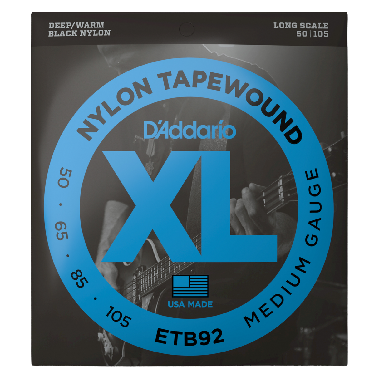 D'Addario ETB92 Nylon Tapewound Medium Gauge guitar strings in black, shown in its retail packaging. The box features a black background with a large blue circular graphic containing the text 'NYLON TAPEWOUND', 'XL', and 'MEDIUM GAUGE'.