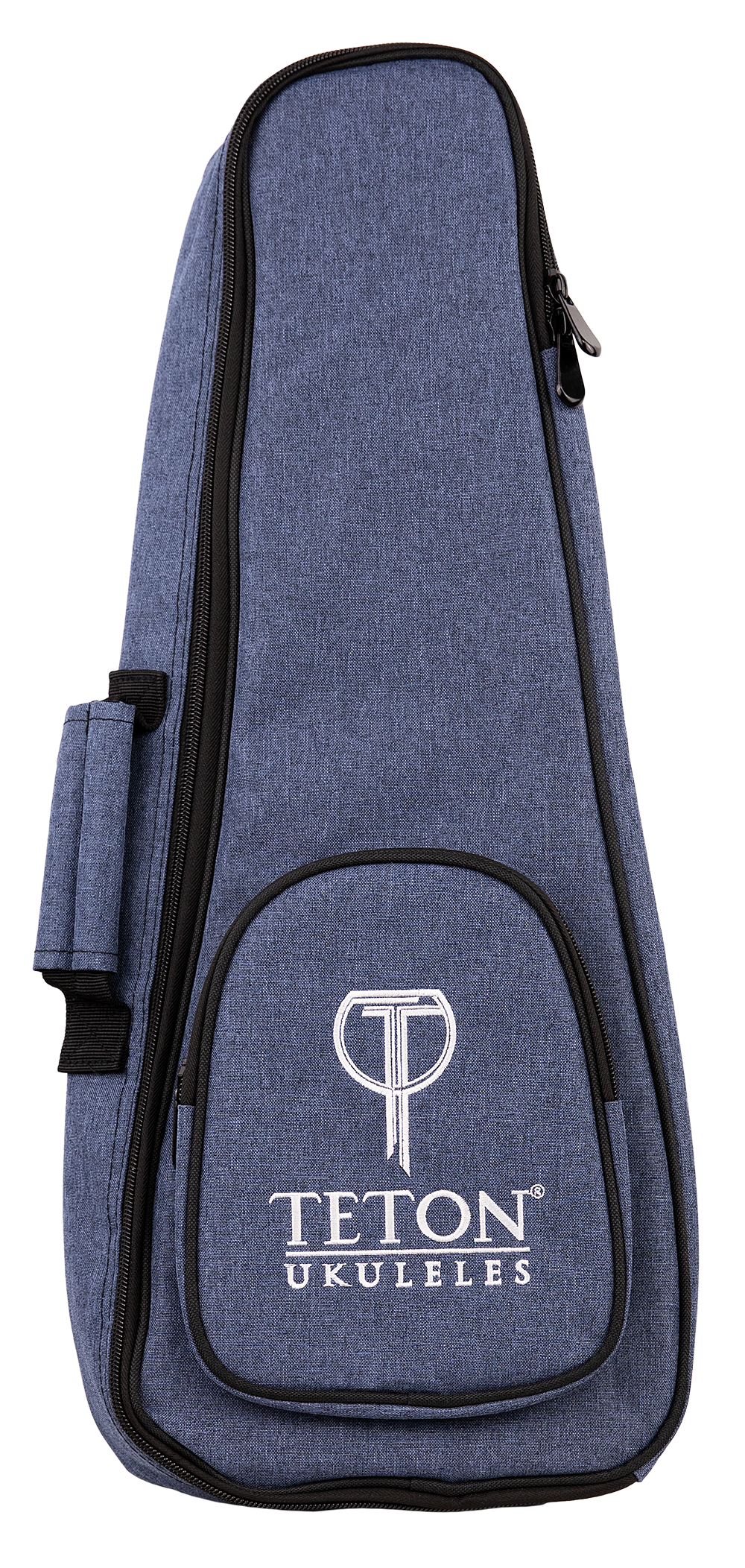 The image shows a Teton TBS25BL soprano ukulele gig bag in black. The bag features a zippered front pocket, padded shoulder straps, and a top handle for easy carrying. Its compact design is tailored to fit a soprano ukulele securely, providing protection during transport. The Teton logo is visible on the front pocket. The background is plain and the bag is displayed upright.