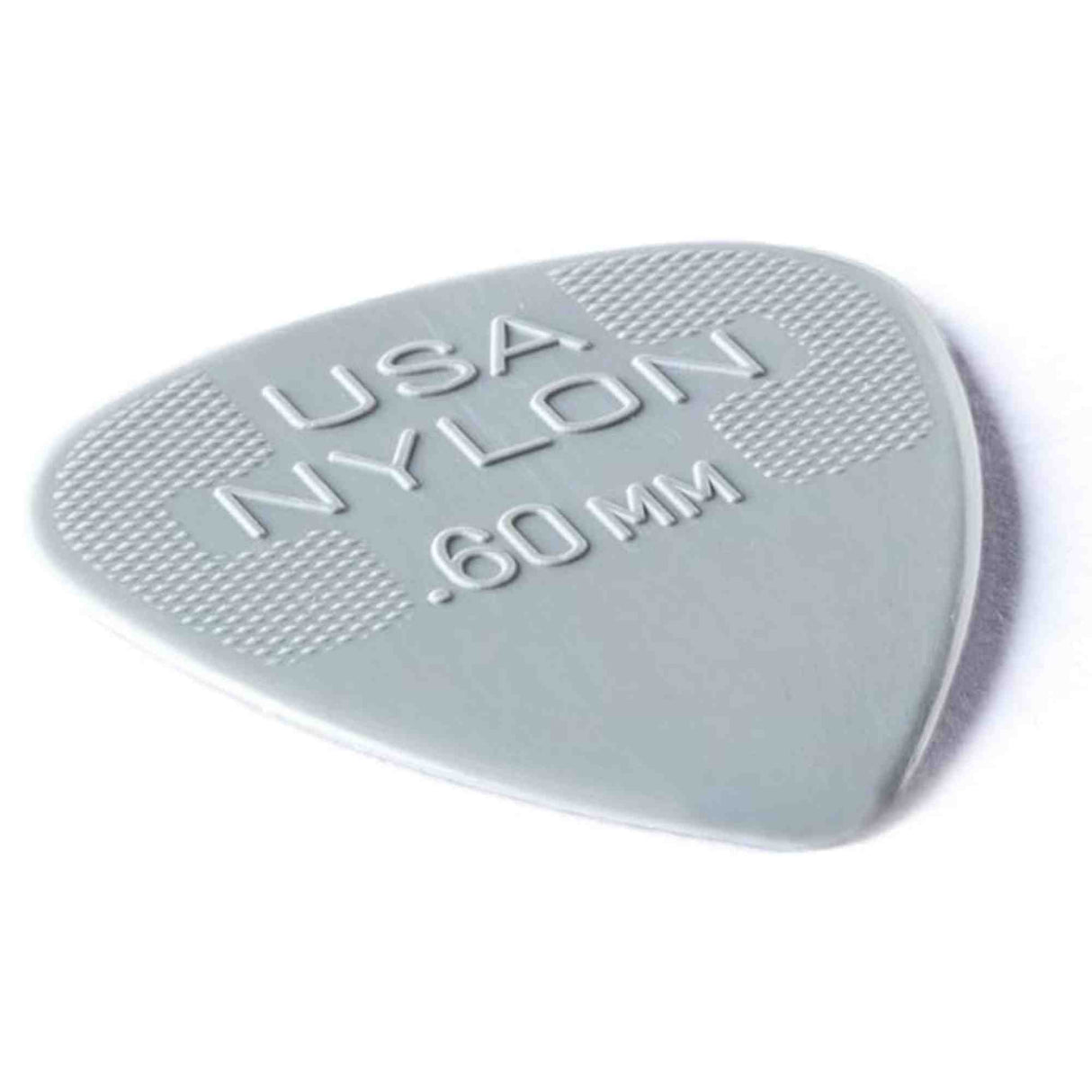 The image shows a grayish-green, semi-translucent nylon guitar pick marked "USA NYLON" with a thickness of 0.60 mm. It has a classic teardrop shape and a textured edge for better grip. This light to medium gauge pick offers a smooth feel and warm tone, making it versatile for both strumming and picking.