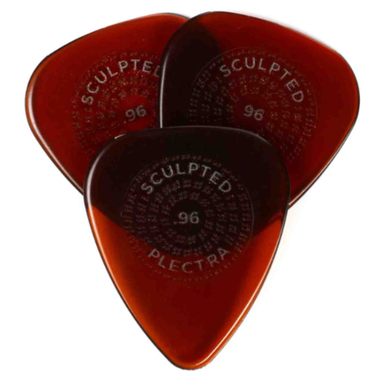 The image shows three Sculpted brand guitar picks marked "96," likely indicating thickness. They have a classic teardrop shape with a tortoiseshell-like amber and reddish-brown finish, glossy and polished. The picks appear to be made of celluloid or similar material and feature embossed text reading "SCULPTED" and "PLECTRUM." These accessories are used for strumming or picking guitar strings.