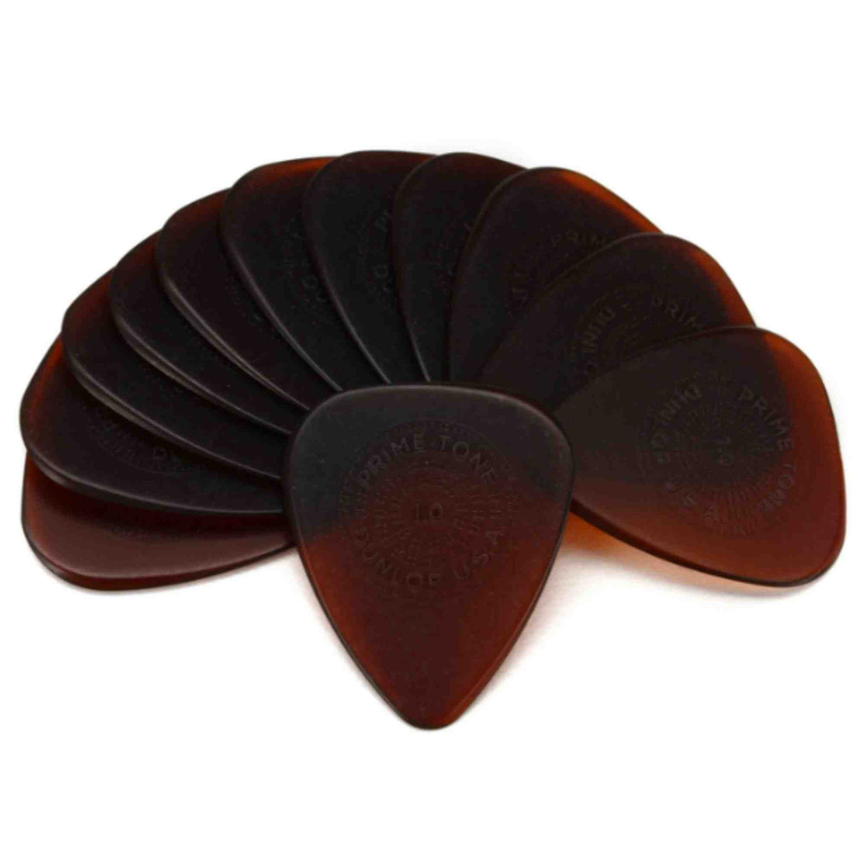 The image shows a collection of tortoiseshell-style guitar picks with a classic teardrop shape, featuring a brown-to-amber gradient. The picks are stacked and fanned out, made from a celluloid-like material mimicking traditional tortoiseshell. Some picks have embossed text. They are standard size and thickness, commonly used by guitarists for strumming or picking.