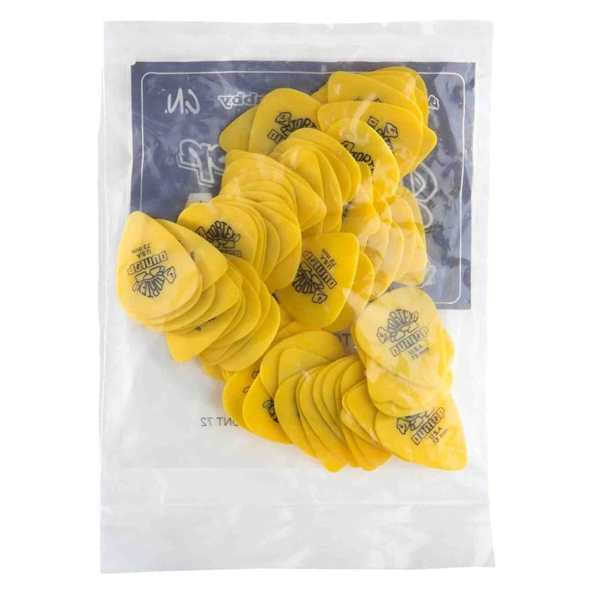 The image shows a collection of yellow Dunlop guitar picks with the brand logo visible, arranged inside a clear plastic container. These picks are essential accessories for playing acoustic, electric, and bass guitars. The quantity and color suggest a bulk or variety pack, ideal for musicians who use picks frequently or like to keep extras on hand.