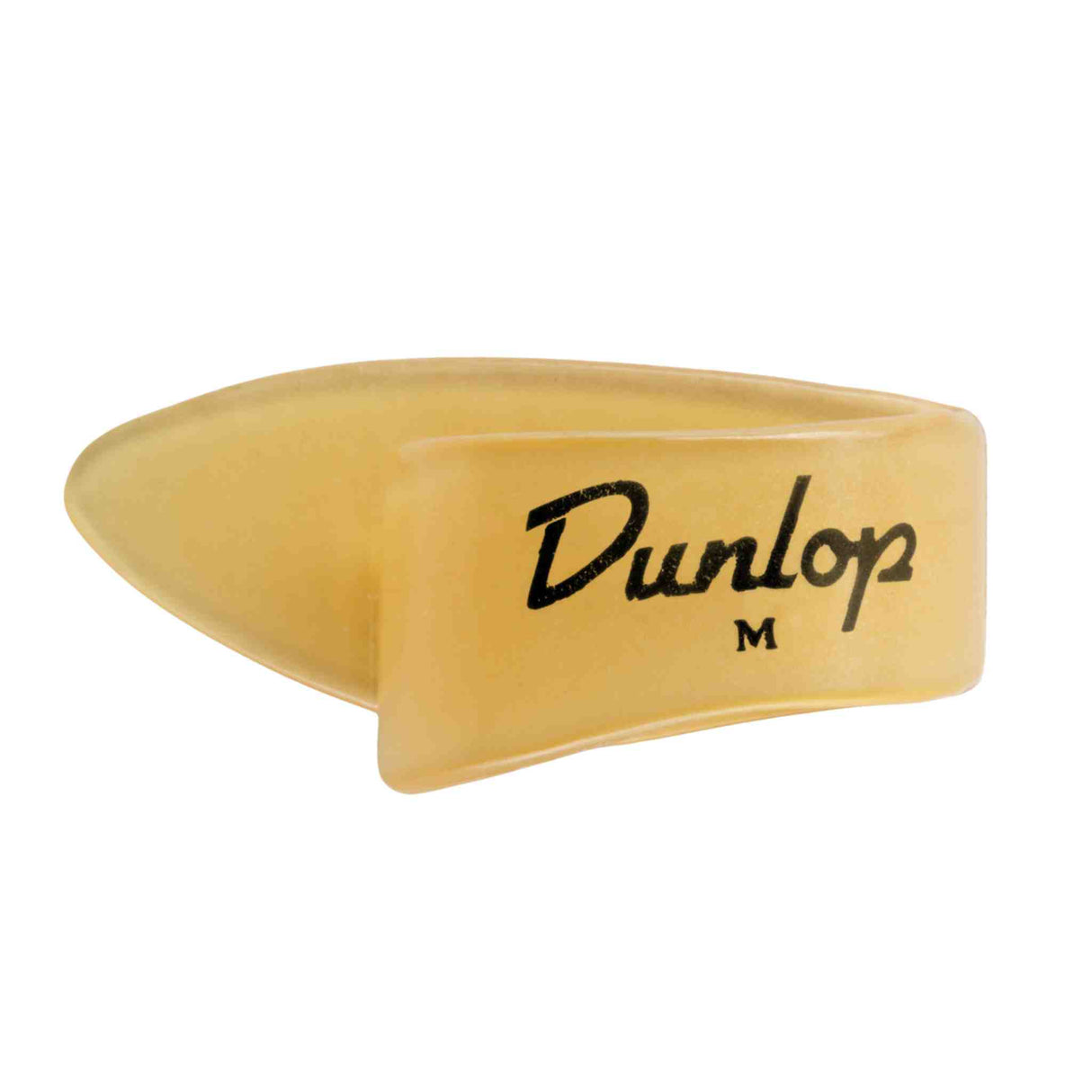 The image shows a Dunlop thumb pick made of translucent amber or cream plastic with a curved band that wraps around the thumb and an extended picking surface. The pick features the "Dunlop" brand name in black script and a size marking "M" for medium. Thumb picks are used by fingerstyle guitarists and banjo players to achieve a brighter tone while allowing complex fingerpicking.