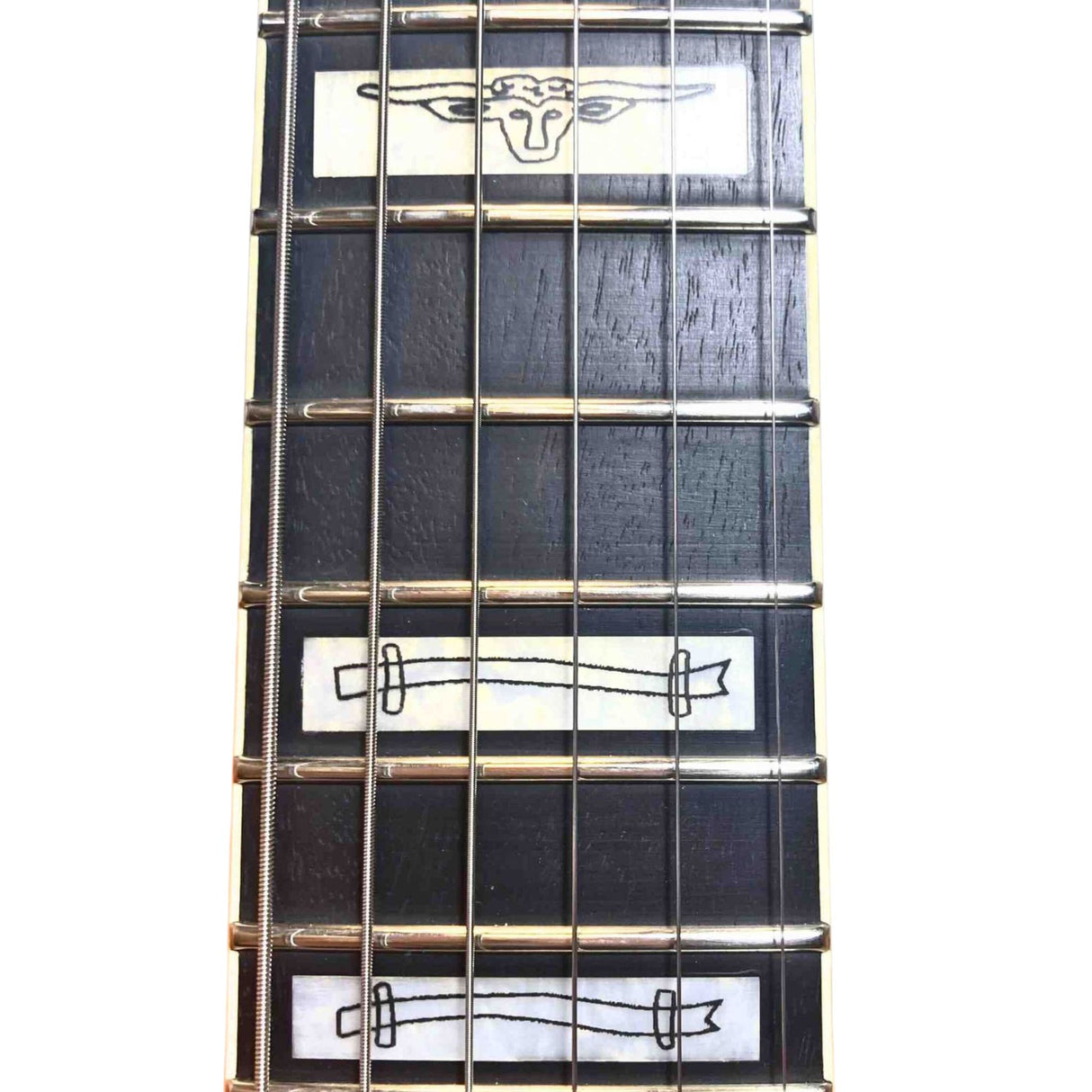 Guitar fretboard with decorative inlays of barbwire fences and steer heads a white background