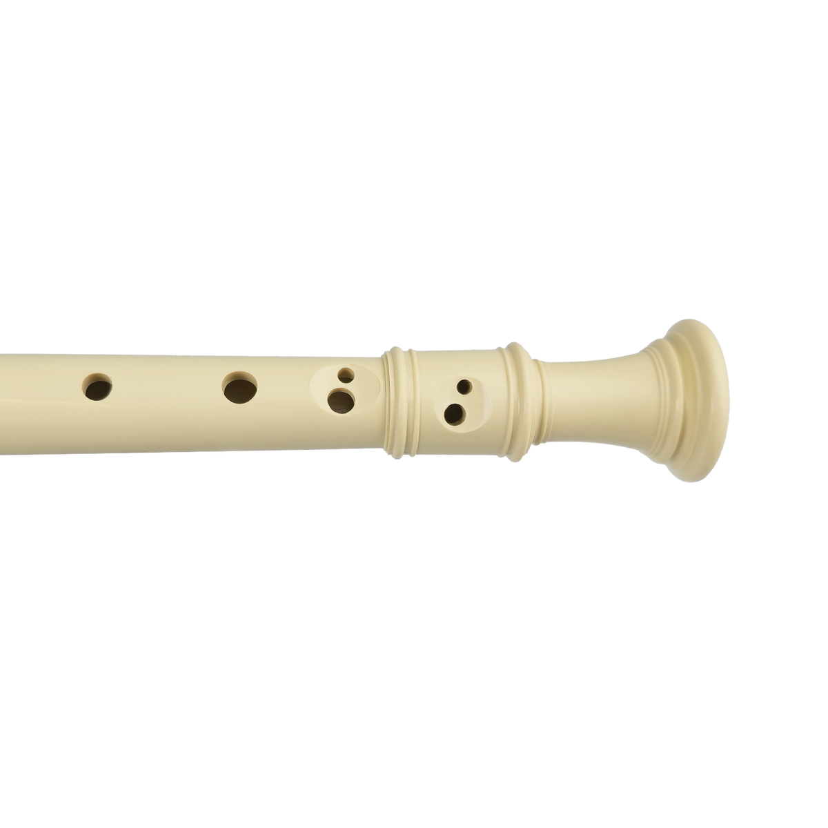 A close view of the fingering holes on a white soprano recorder.