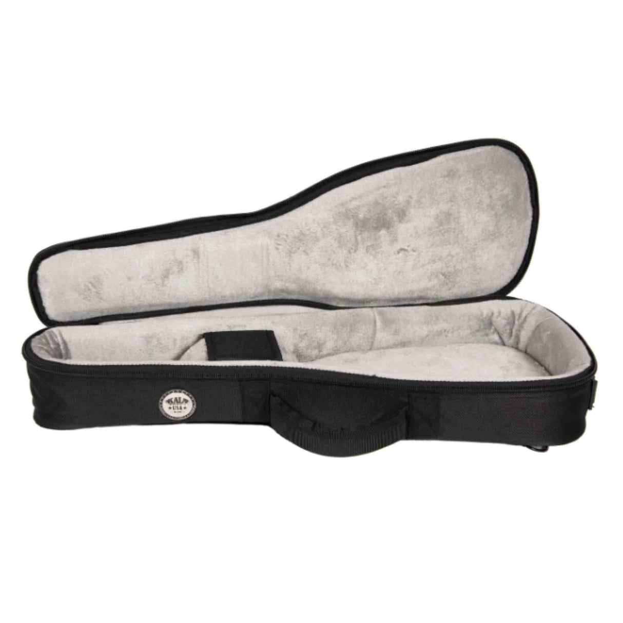 The image shows an open soft guitar case (gig bag) designed for acoustic guitars, with a black exterior and light gray/beige padded interior. It has a typical guitar shape, wider at the body and narrower at the neck. A small circular logo is visible on the outside, and a dark rectangular compartment is inside. The case has black binding and padded protection, offering lightweight, durable transport for musicians.