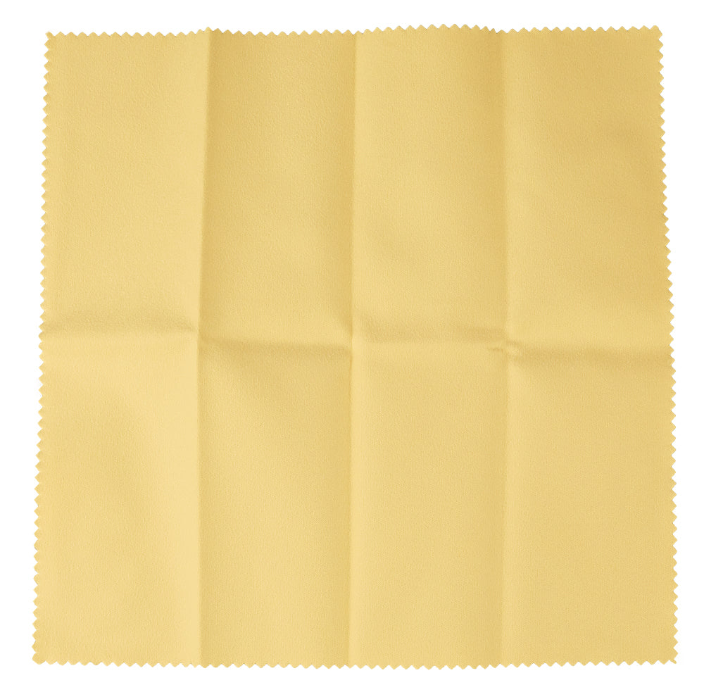 The image shows a yellow microfiber cleaning cloth with pinked edges, commonly used in the musical instrument industry. It’s soft and lint-free, ideal for cleaning guitars, pianos, brass, woodwind, and string instruments. The cloth gently removes fingerprints, dust, oils, and rosin without scratching, making it essential for maintaining and protecting delicate instrument finishes.