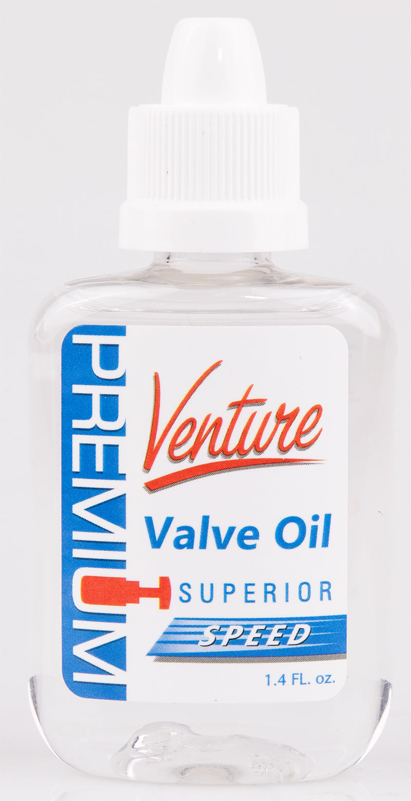 The image shows a 1.4 FL. OZ. clear plastic squeeze bottle of Venture Valve Oil, Superior Speed formula, with a white dropper cap. This specialized lubricant is used to maintain the smooth, fast movement of valves in brass instruments like trumpets, French horns, trombones, and tubas, essential for optimal performance and instrument care.