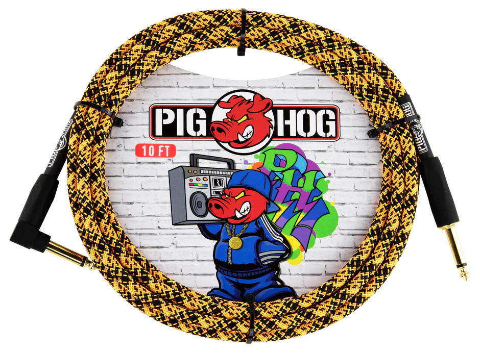 The image shows a Pig Hog guitar cable with a yellow and black braided exterior, gold-plated 1/4" connectors, and black housings. The packaging features the Pig Hog logo with a red pig mascot dressed in a blue tracksuit holding a boom box, set against colorful graffiti-style lettering and a brick wall background. The 10 FT cable is known for durability and quality, favored by musicians for reliable instrument connections.