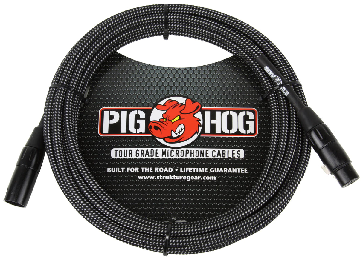 The image shows a Pig Hog Tour Grade microphone cable with XLR male to female connectors. It features a black woven cable, the red pig mascot logo, and branding that includes "Built for the Road" and "Lifetime Guarantee." This professional-grade cable is designed for touring musicians and live performances. Manufacturer's website: strutturegear.com.
