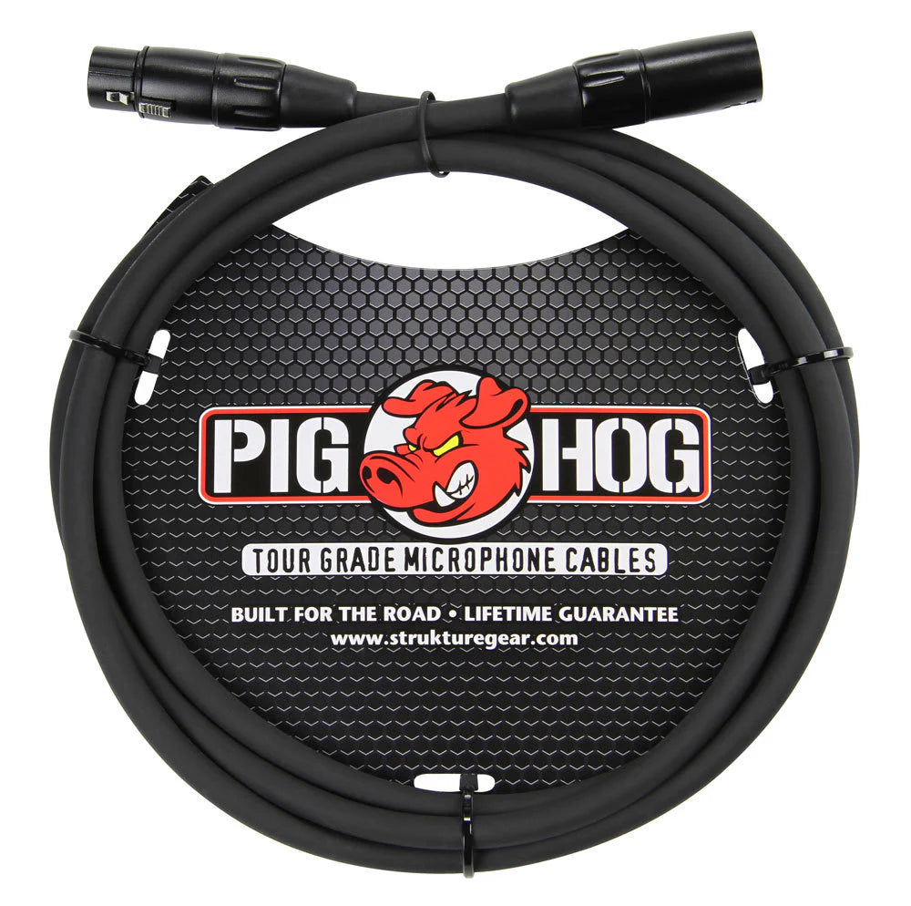 The image shows a Pig Hog tour-grade XLR microphone cable with black male and female connectors. It features heavy-duty black construction, the red Pig Hog logo, and packaging stating "Built for the Road" with a lifetime guarantee. Made by Strukture Gear, this professional cable is designed for durability and reliability in live performance and touring environments.