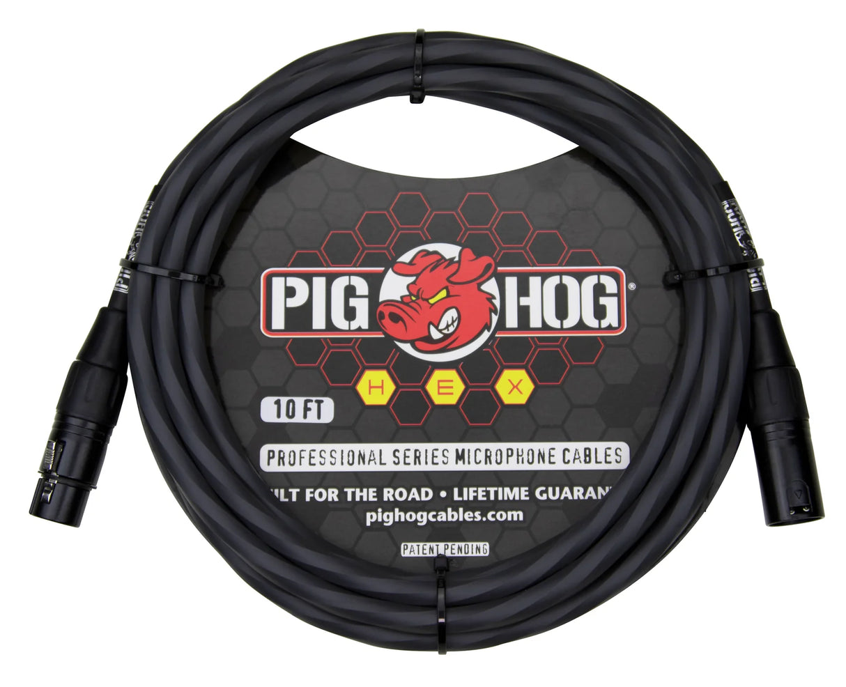 The image shows a Pig Hog Professional Series 10-foot XLR microphone cable with male and female connectors. It features a black heavy-duty jacket, the red Pig Hog pig mascot logo, and a yellow "HEX" label. The packaging has a honeycomb pattern. Designed for professional use, it offers touring-grade durability and a lifetime guarantee, ideal for connecting microphones to audio equipment.