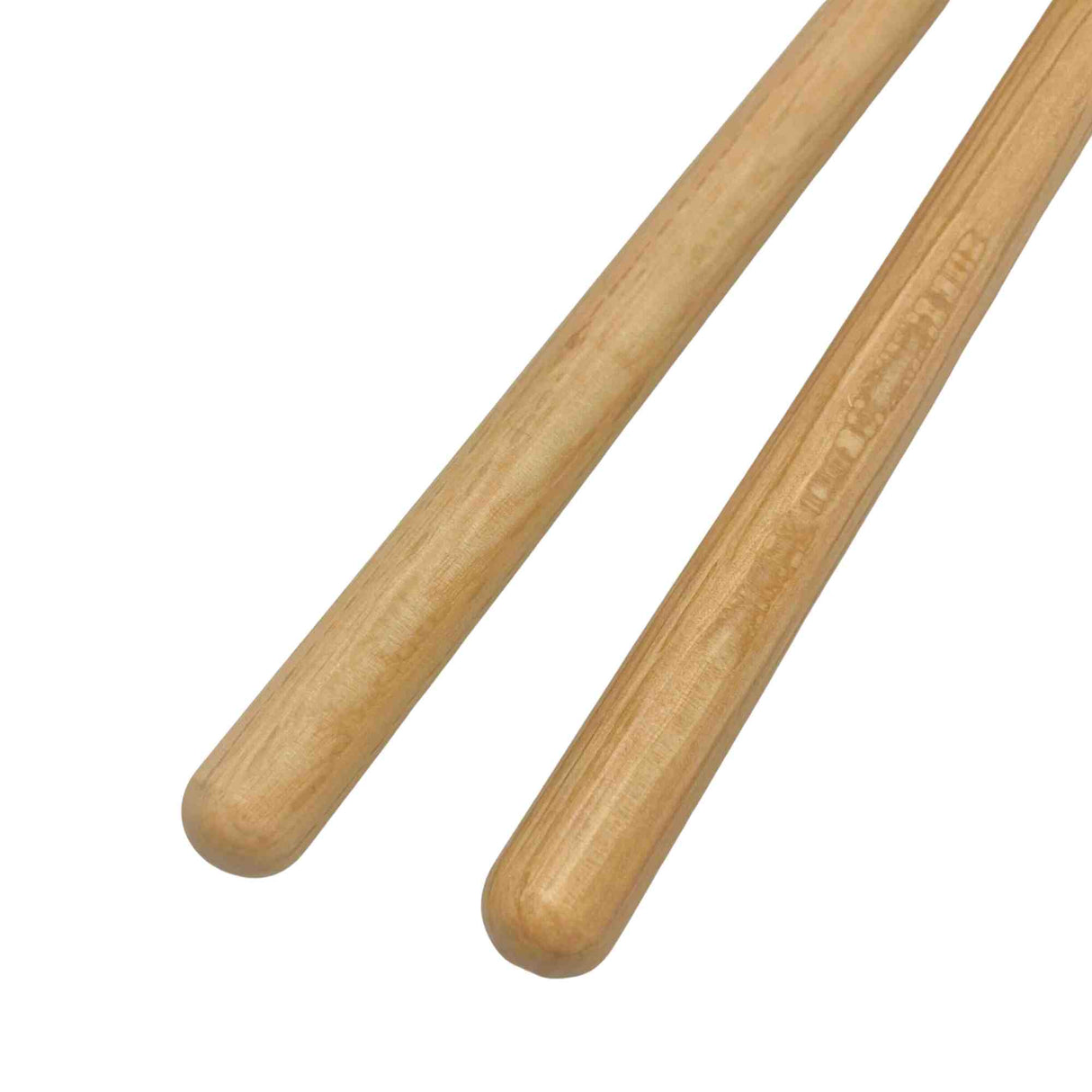 The image shows a pair of light-colored wooden drumsticks, likely made of hickory or maple. They feature a classic tapered design with rounded tips and standard size, suitable for drum kit playing. One stick has visible branding or text, typical for identifying the manufacturer, model, or size. These drumsticks are essential tools for drummers to play various percussion instruments across musical genres.