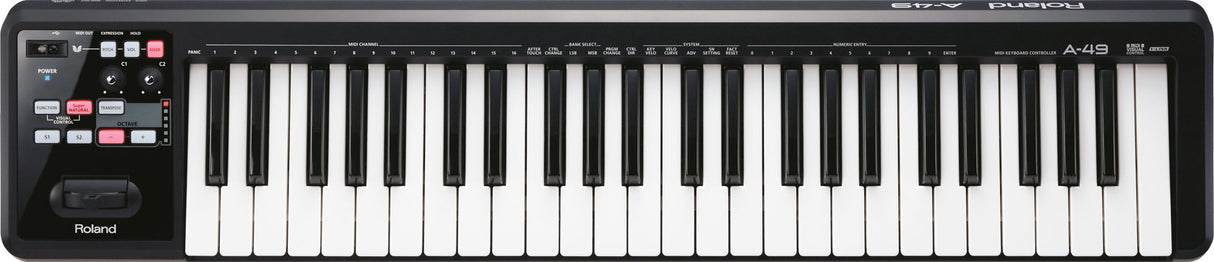 The image shows a Roland A-49 MIDI keyboard controller with 49 standard piano keys and a black casing. It features a control panel on the left with a power button, transport controls (play, stop, record), various parameter buttons, and a small display. Designed for music production, it controls software instruments and DAWs, making it popular for studio and live use due to its compact, portable design.