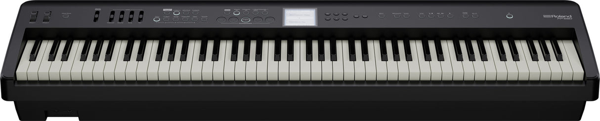 The image shows a Roland digital piano with 88 full-size black and white keys in a sleek black casing. The Roland logo is visible on the upper right. Above the keys is a control panel with various buttons and a small LCD screen for selecting sounds, adjusting settings, and accessing functions. This professional-level instrument is suitable for home use and performances.