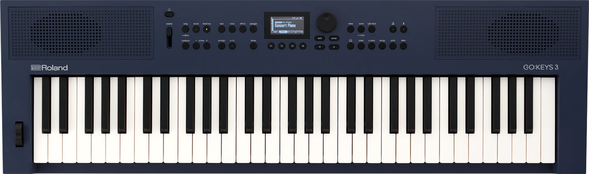 The image shows a Roland GO:KEYS 3 electronic keyboard with a 61-key piano-style layout in a dark blue body. It features built-in speakers on both sides, a small central LCD screen, multiple control knobs and buttons for sound and rhythm settings, and volume controls. The Roland logo is on the left, with the GO:KEYS 3 model name on the right. This portable keyboard is designed for beginners and casual players.