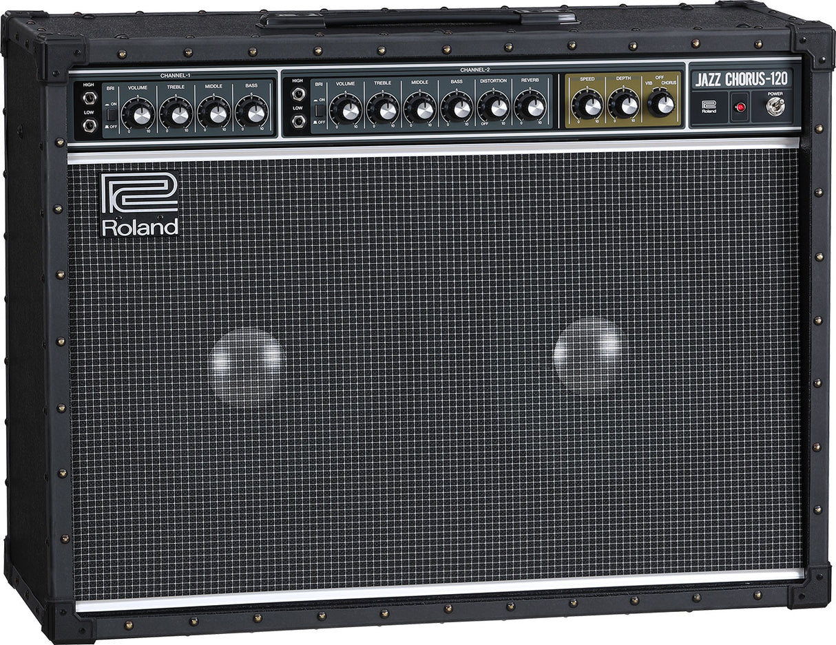 The image shows a Roland Jazz Chorus-120 guitar amplifier with a black tolex exterior, metal corner protectors, and a large grille covering dual speakers. The control panel features two channels, multiple tone and volume knobs, and built-in effects like chorus and reverb. The amp is known for its clean tone, 120-watt power, and durable, professional-grade construction favored by jazz and clean guitar players.