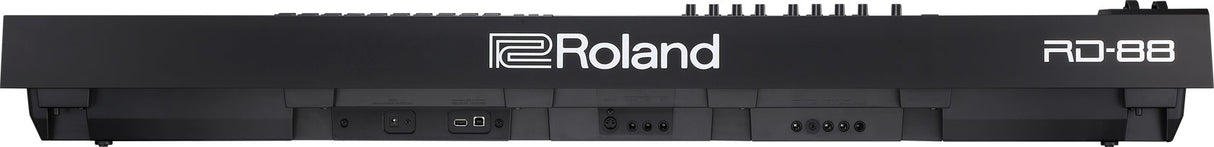 The image shows a Roland RD-88 digital stage piano with 88 weighted keys, a sleek black design, and the model name on the right. Roland branding is centered, with control buttons along the top panel. It has a compact, speakerless form ideal for live performances and studio use, known for high-quality sounds and portability favored by professional musicians.